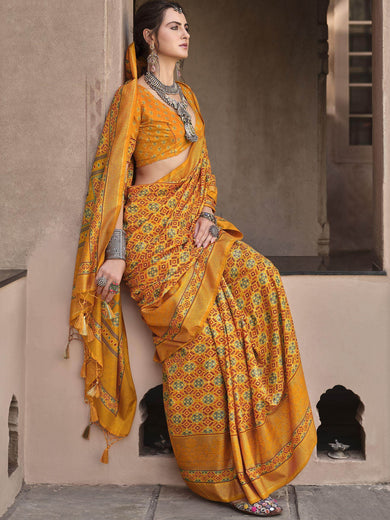 Bewitching Mustard Patola Printed Silk Haldi Wear Saree With Blouse